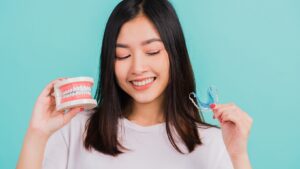 Patient enjoying a beautiful smile after Teeth Straightening Surrey treatment.